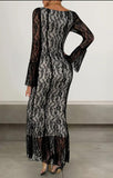 Elegant black lace dress with sleeves